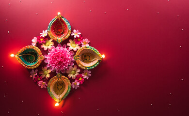 Happy Diwali - Clay Diya lamps lit during Diwali, Hindu festival of lights celebration. Colorful...