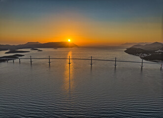 Aerial view of the Peljesac bridge at sunset