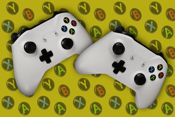 Two gaming gamepads in flight on a yellow background with buttons for games © Denis Barysau