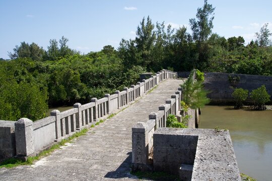 Shimajiri Irie Bridge crossing a river in a mangrove forest