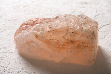 Large piece of Himalayan salt on a white background