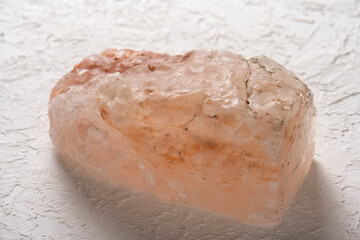 Large piece of Himalayan salt on a white background
