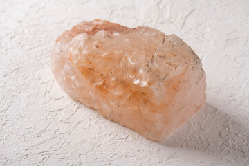 Large piece of Himalayan salt on a white background