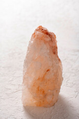 Large piece of Himalayan salt on a white background