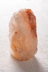 Large piece of Himalayan salt on a white background