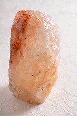 Large piece of Himalayan salt on a white background