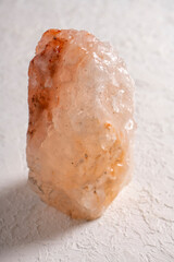 Large piece of Himalayan salt on a white background