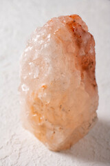 Large piece of Himalayan salt on a white background