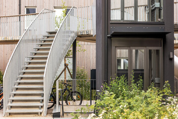 Yard of Modern Apartment Buildings with Outdoors Stairs and Outside Lift. Modern European...