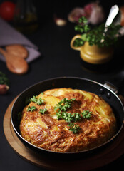 Traditional Spanish dish tortilla on the table