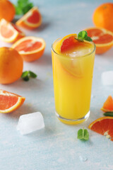 Red oranges juice with mint and ice