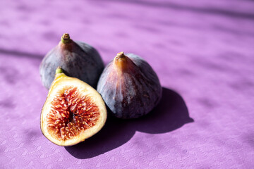 figs in sunlight. half a fig. Healthy food, useful product. Autumn, harvest