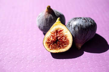 figs in sunlight. half a fig. Healthy food, useful product. Autumn, harvest