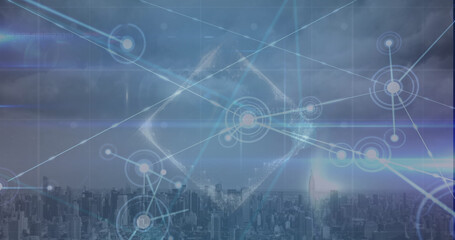 Image of network of connections with light trails over cityscape