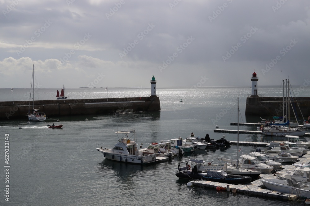 Sticker boats in the harbor with a cloudy weather 