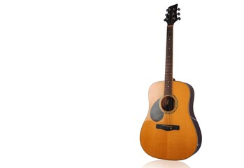 Obraz premium wooden guitar natural view, sea, setting sun Musical nature, wooden floors, travel, views, musical instruments, conveying music and nature.