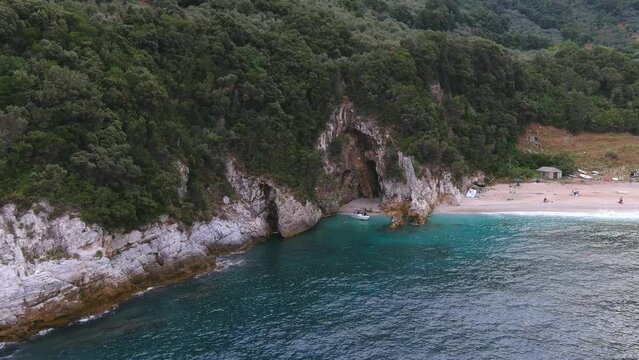 Small boat on rocky beach, Pelion, Greece, aerial
Pelion, greece,August,25,2022, drone view
