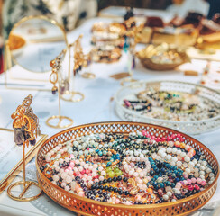 beautiful jewelry on the table, jewelry with healing stones.