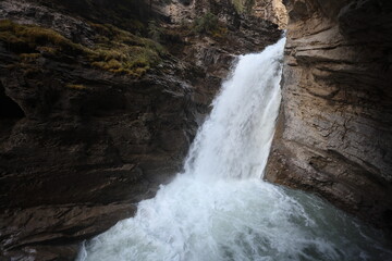 waterfall in johnston canyon banff national park