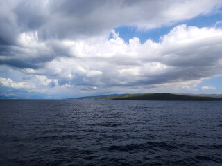 Fototapeta premium clouds over the sea