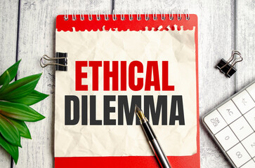 ethical dilemma, text on white paper and red notepad on wooden background