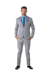 Businessman standing with arms on pockets