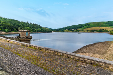 A view from the dam wall across Ladybower reservoir, Derbyshire, UK in summertime