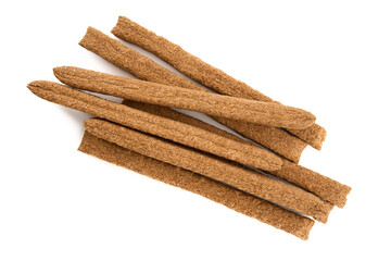 Creative layout made of crackers sticks on the white background. Food concept. Edible snack dry sticks with salt on white background. Straws, sticks crackers.