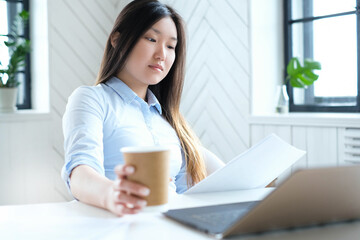 Post-Office Serenity: A Young Asian Woman Captured in Different Poses during a Relaxing Photoshoot