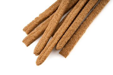 Creative layout made of crackers sticks on the white background. Food concept. Edible snack dry sticks with salt on white background. Straws, sticks crackers.