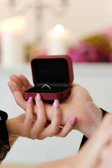 Portrait of beautiful young couple posing in black clothing