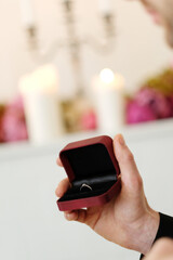 Portrait of beautiful young couple posing in black clothing