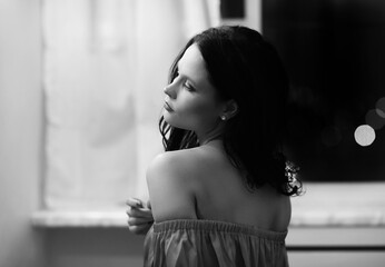 Fototapeta premium Intimate Moments: Capturing Sensual Poses of a Brown-Haired Model