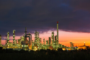 Oil​ refinery​ and​ plant and tower of Petrochemistry industry in oil​ and​ gas​ ​industry with​ cloud​ blue​ ​sky the morning​
