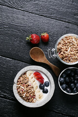 Healthy breakfast set on grey background. The concept of delicious and healthy food.