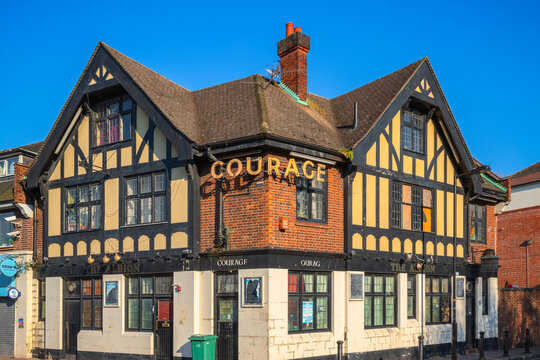 London, UK - 25 August, 2022 - A Traditional English Pub In Mock Tudor Style Around Canada Water