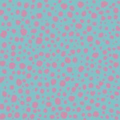 Seamless polka dot background . Pink dots on blue background.