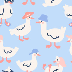 Seamless pattern with cute ducks in hats