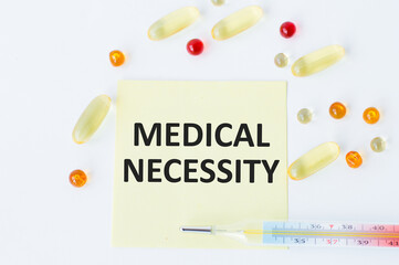 on the business card the text MEDICAL NECESSITY