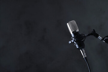 Fototapeta premium Retro Microphone On Stage With Bokeh Light
