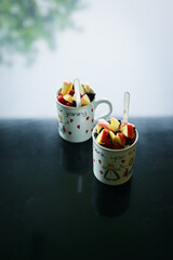 mix fruit in the mug ,various fruit such as apple and berry