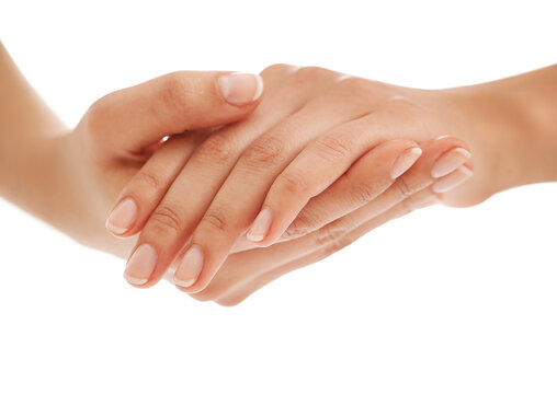 Beautiful woman hands with french manicure isolated on white background.