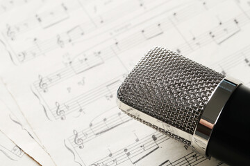 Music microphone on piano and vocal notes