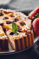 A piece of fresh tasty homemade pie with berries on the plate