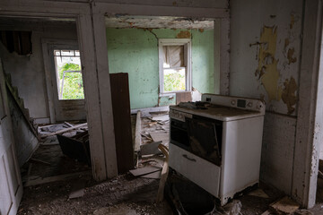A badly damaged abandoned house interior