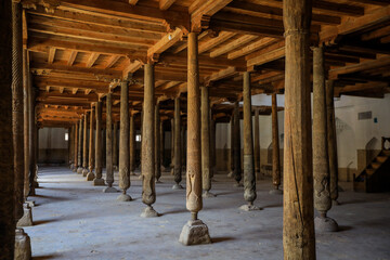 Ancient Wooden Juma Mosque with Curved Pillars of Itchan Kala, in the walled Old City of Khiva,...