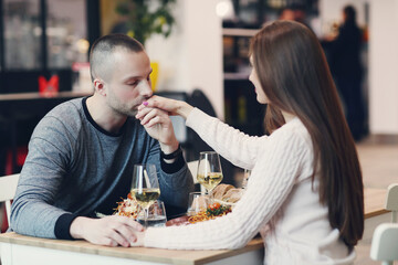 Young couple sitting in a restaurant for a romantic dinner