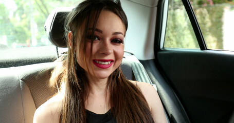 Fototapeta na wymiar Portrait of young millennial girl in backseat of car-2