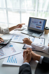 business people meeting in the office Calculate the tax and income of the company's investment. Strategic Planning and Brainstorming colleague concept, report, analyze graph plans