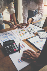 Fototapeta business people meeting in the office Calculate the tax and income of the company's investment. Strategic Planning and Brainstorming colleague concept, report, analyze graph plans obraz